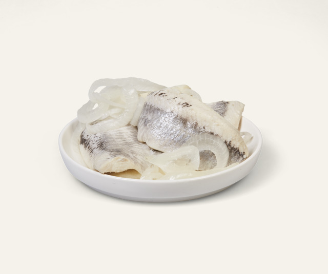 Haringfilets met ajuin in zachte saus